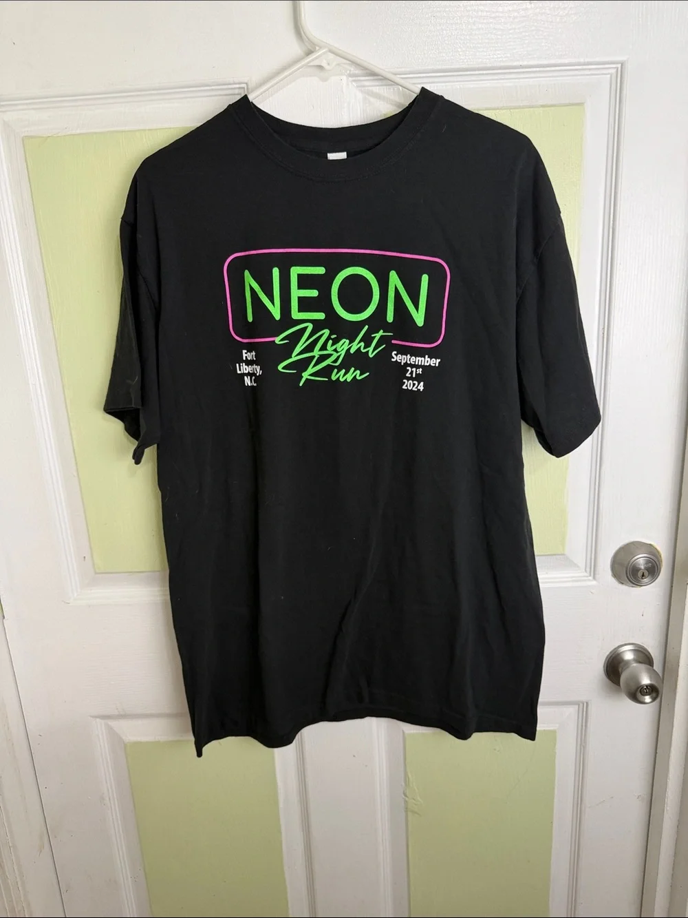 (2353) Gildan Black Short Sleeve Tee with Neon Green and Pink Graphic, Size: L